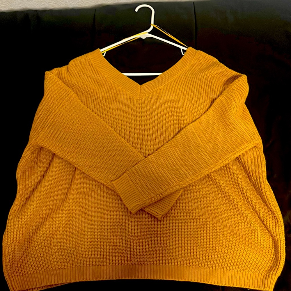 Had a sexy back, the color is like dark yellow!
